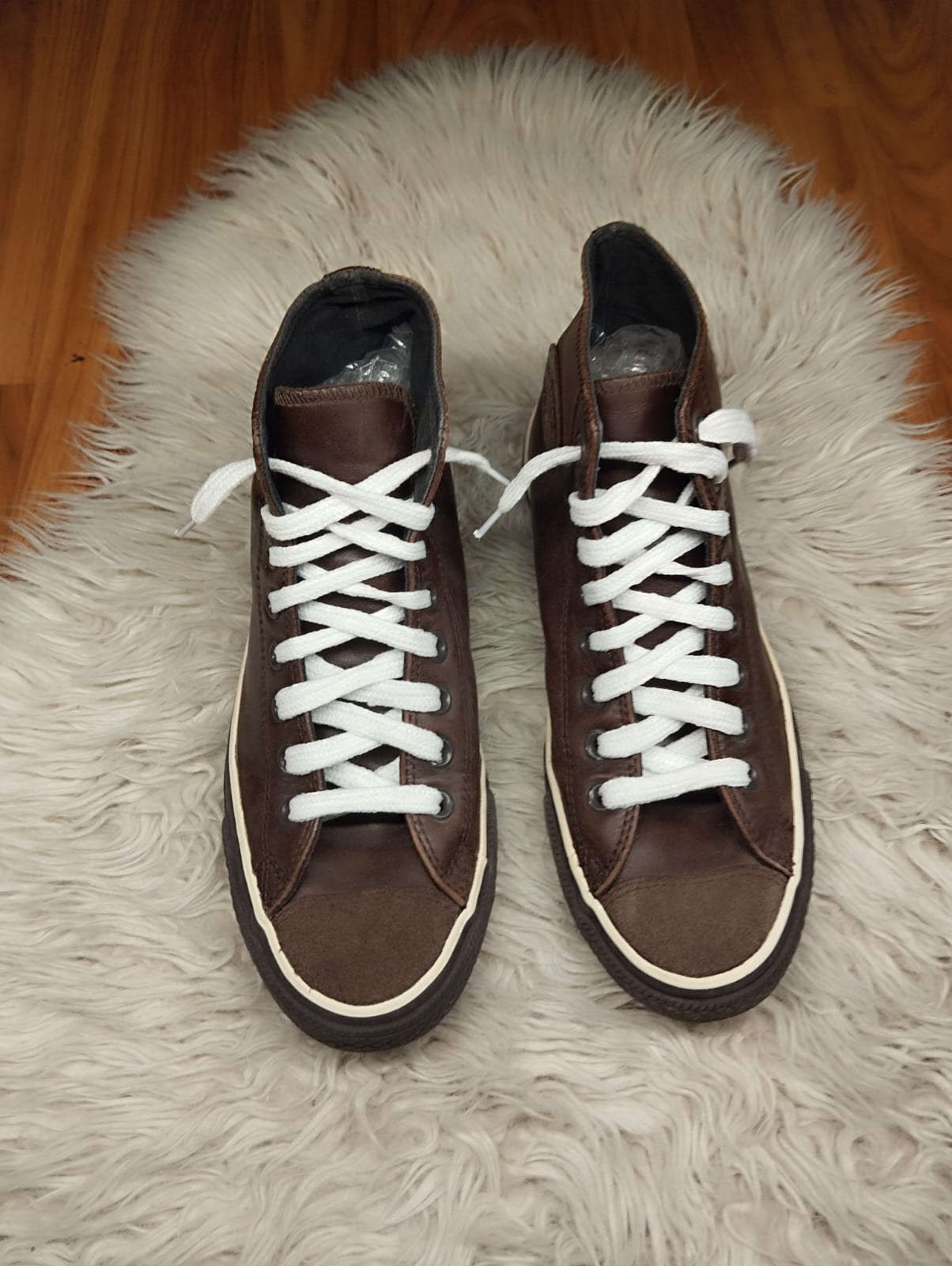 Brown leather high rise converse