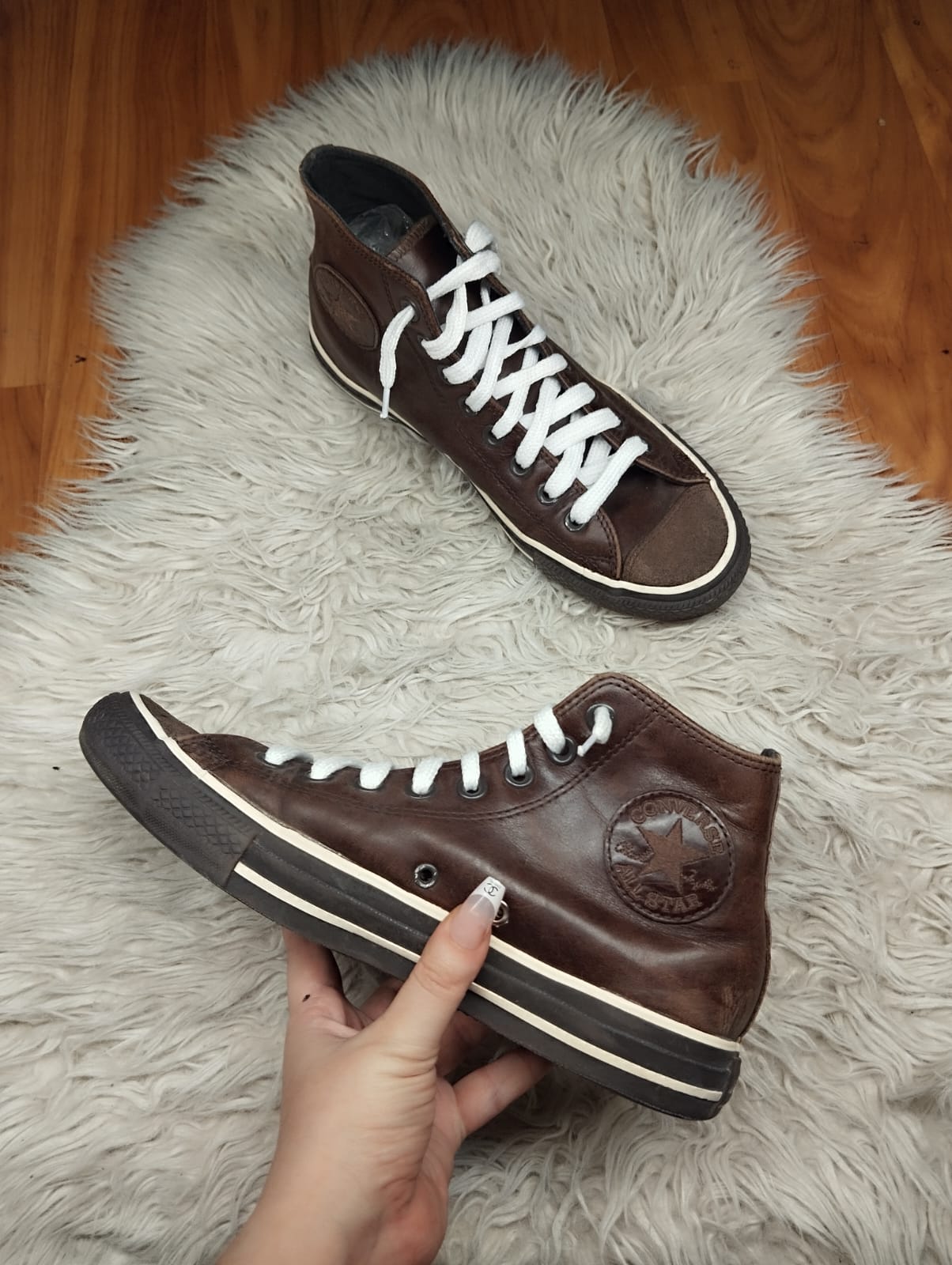 Brown leather high rise converse