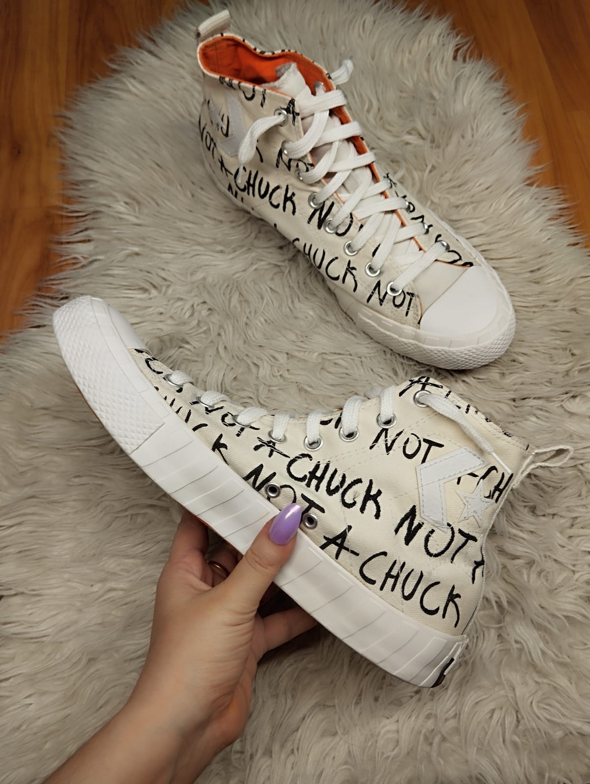 White and orange high rise converse