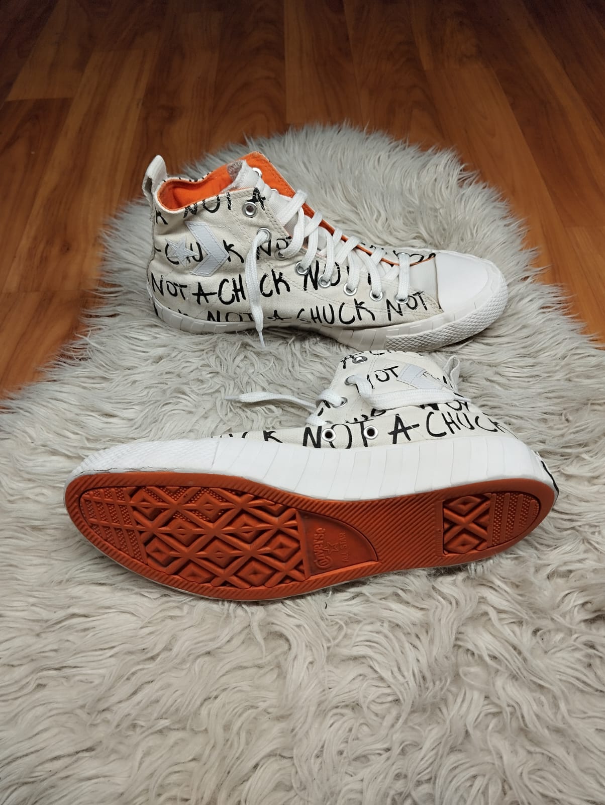 White and orange high rise converse