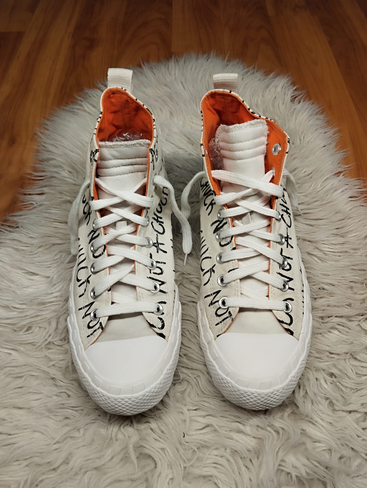 White and orange high rise converse