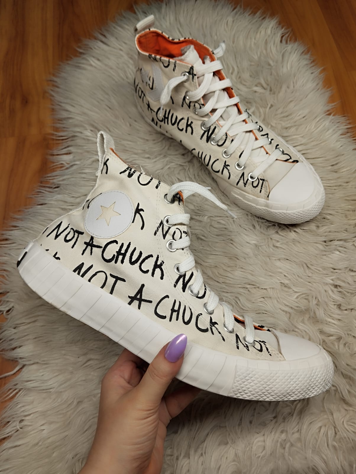 White and orange high rise converse