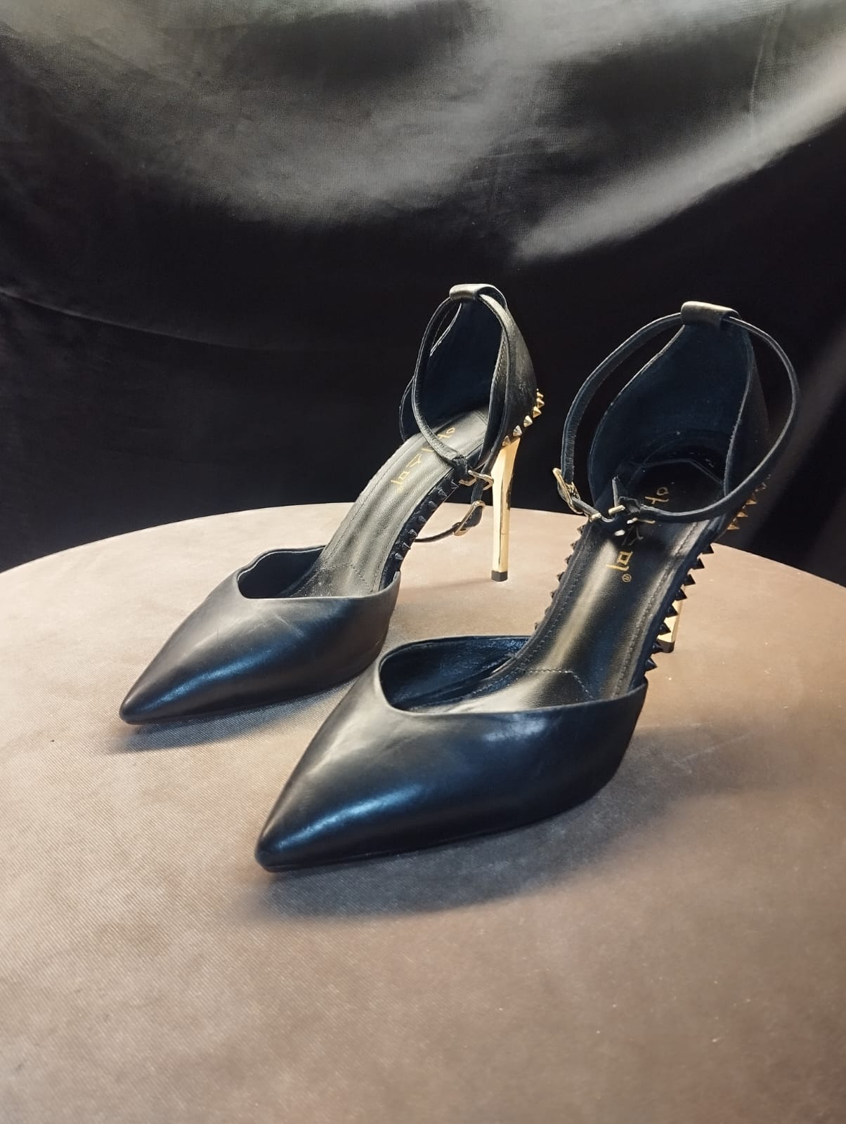 Black spikes heel