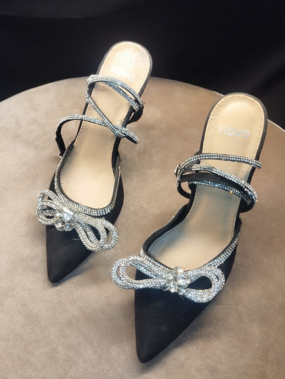Black bow heel