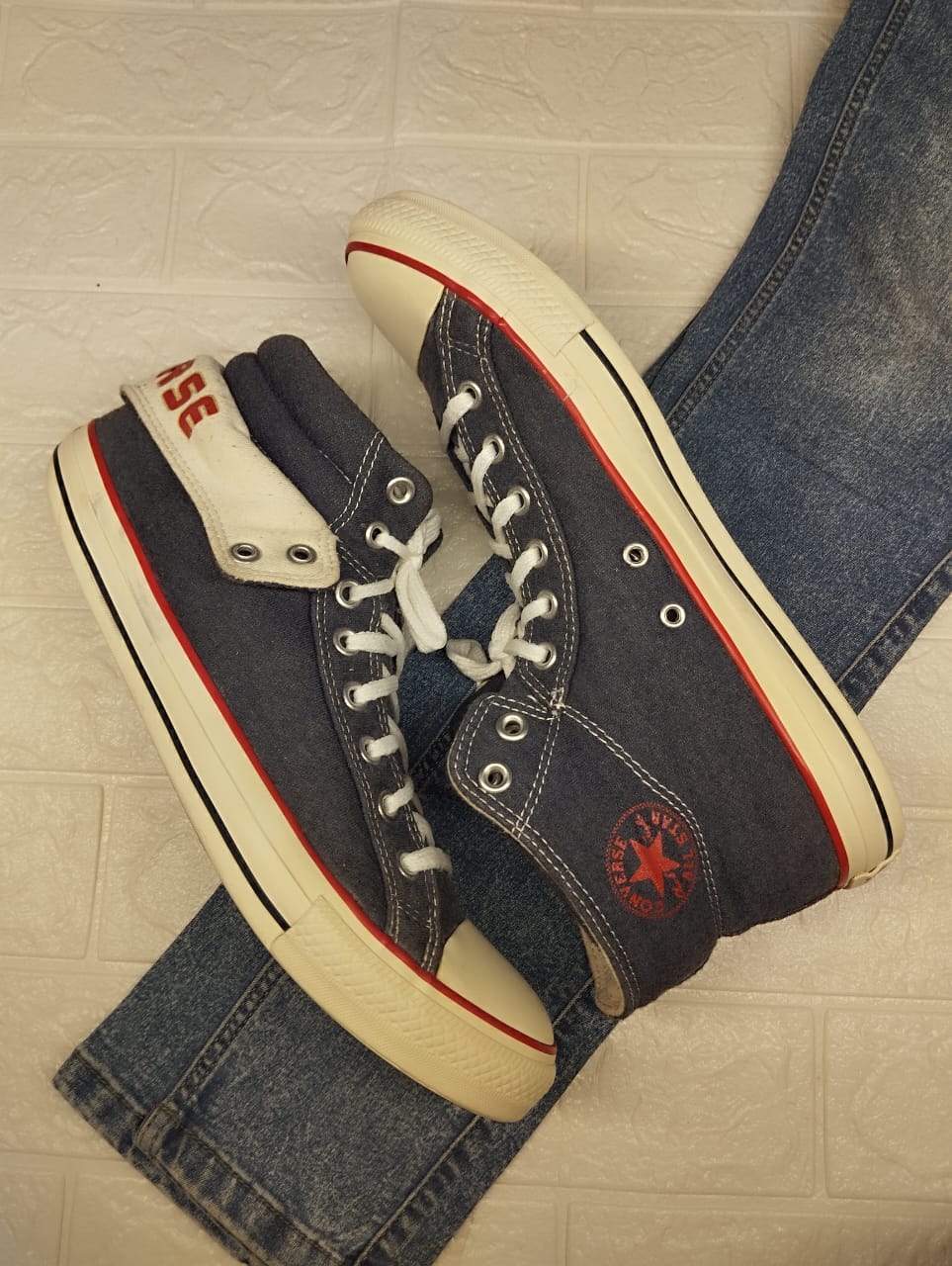 Blue and white high rise converse