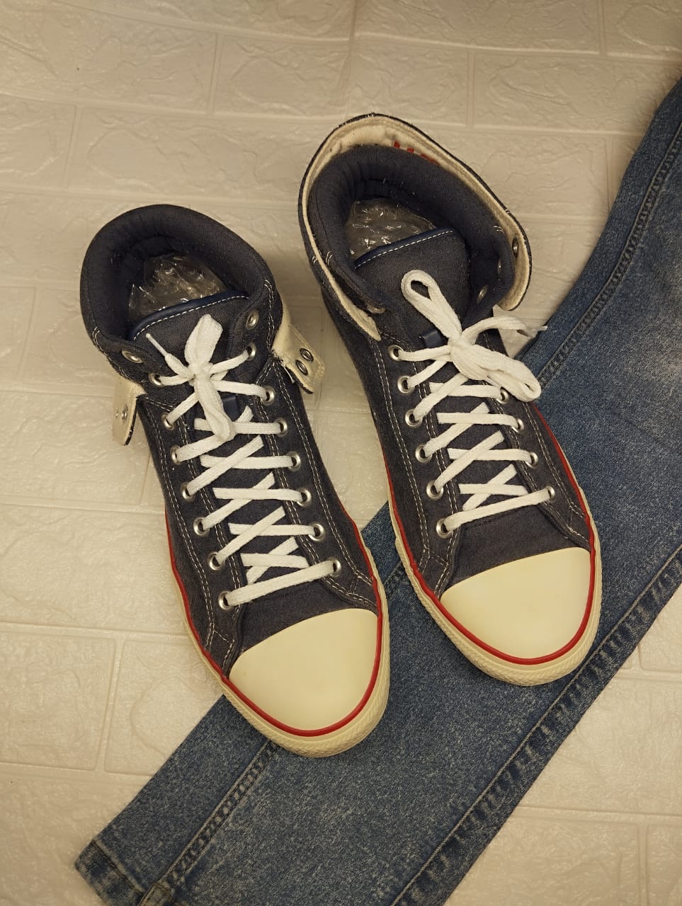 Blue and white high rise converse