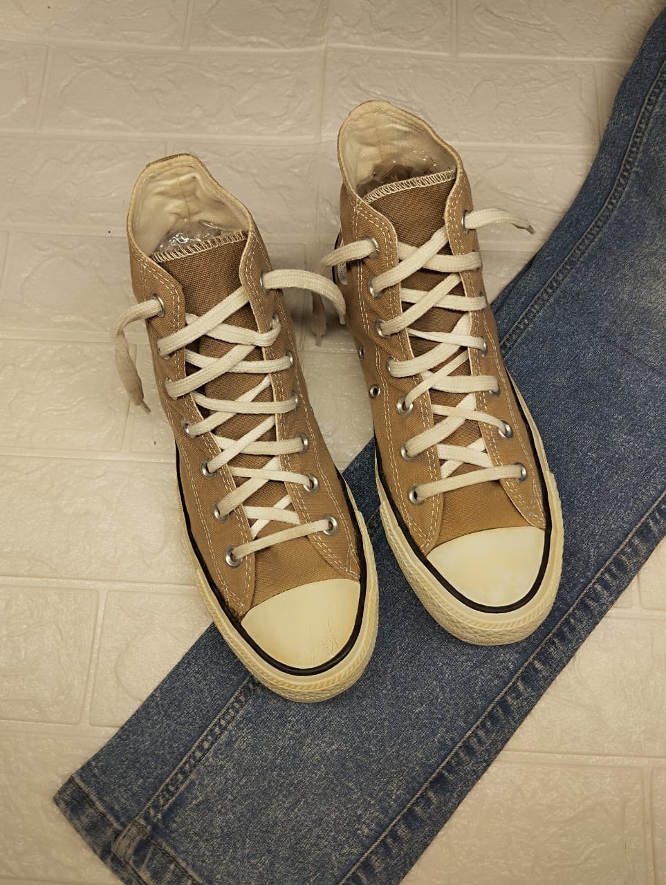 Beige high rise converse