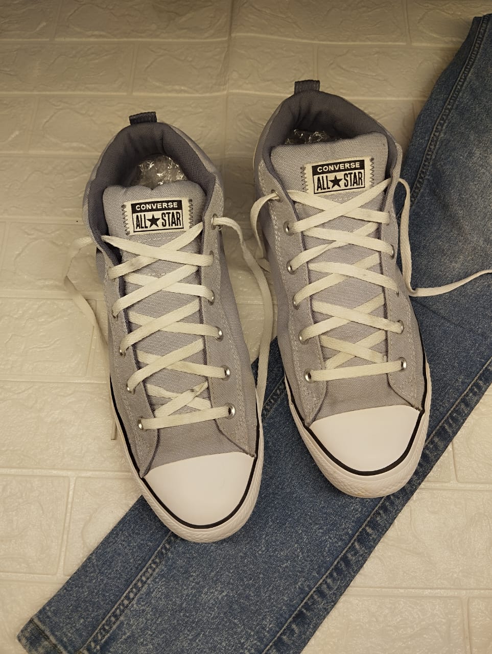 Grey ankle cut converse