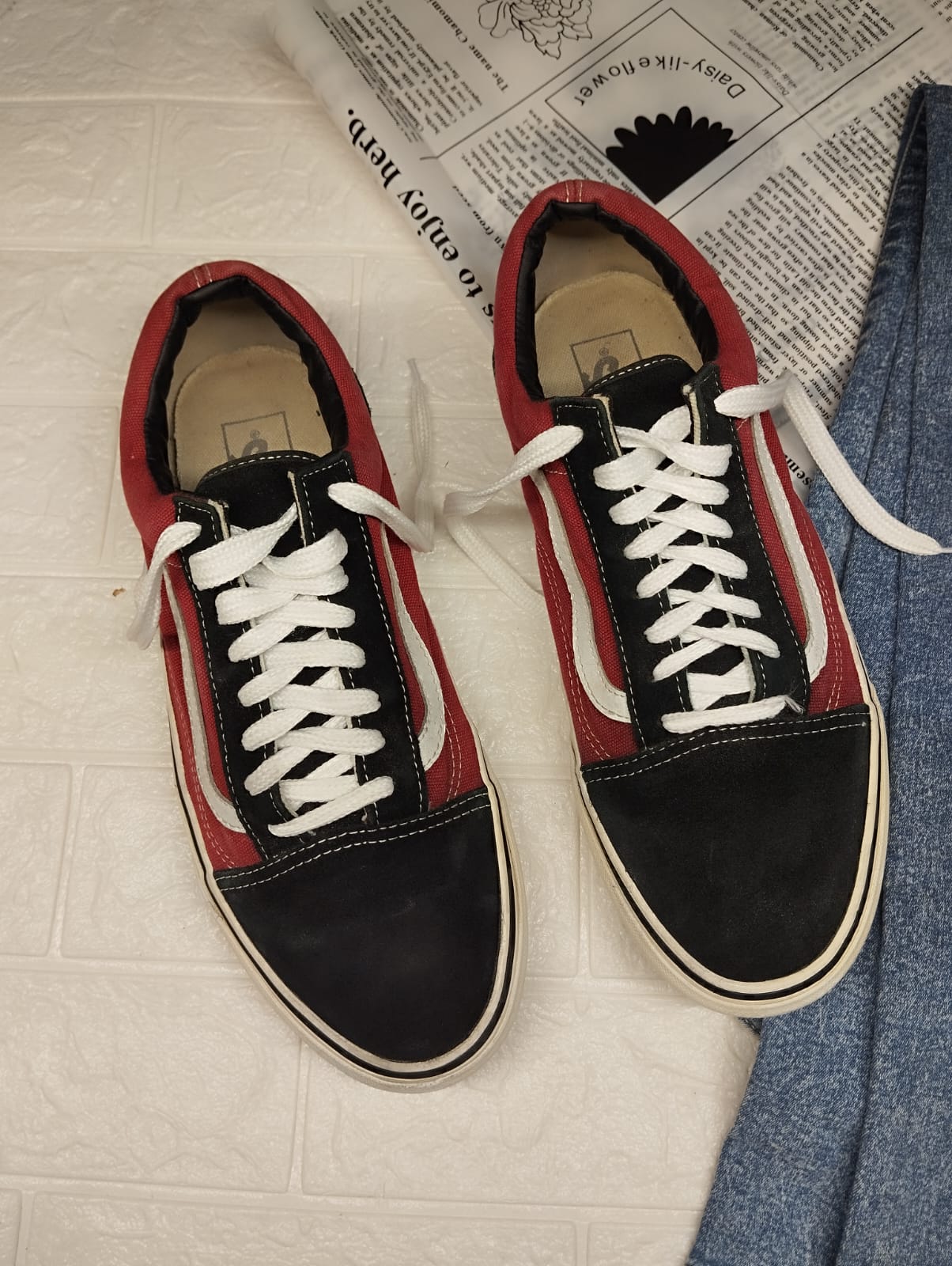 Red and black low rise vans