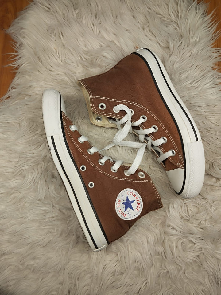Brown high rise converse