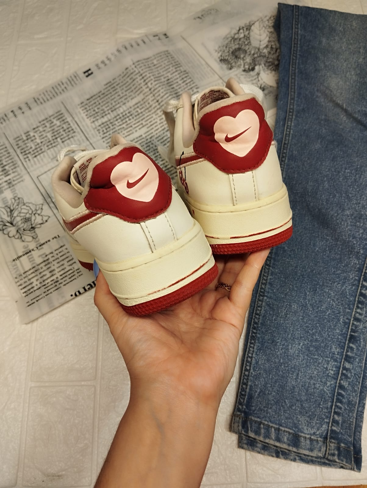 Red and white nike sneakers