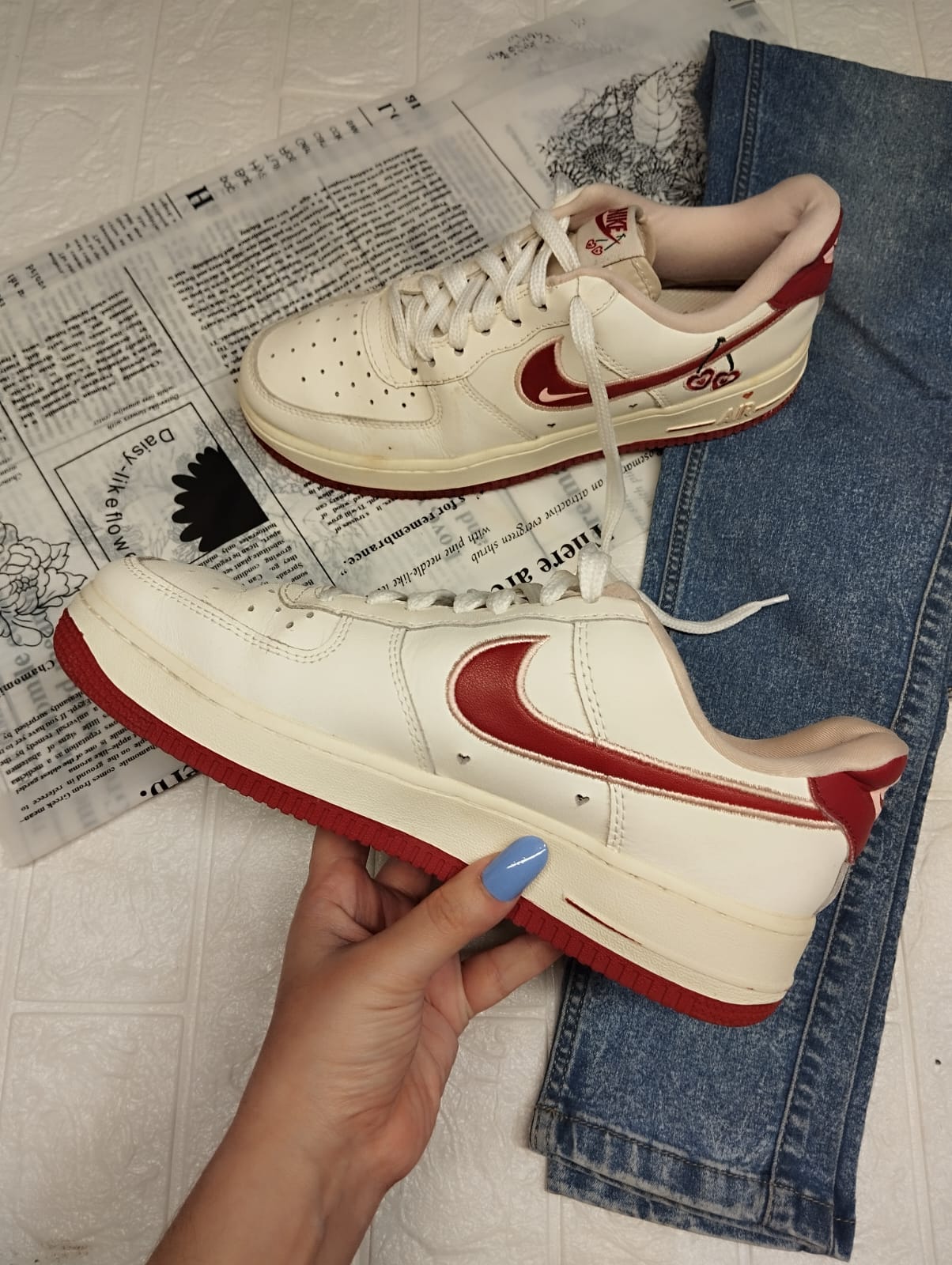 Red and white nike sneakers
