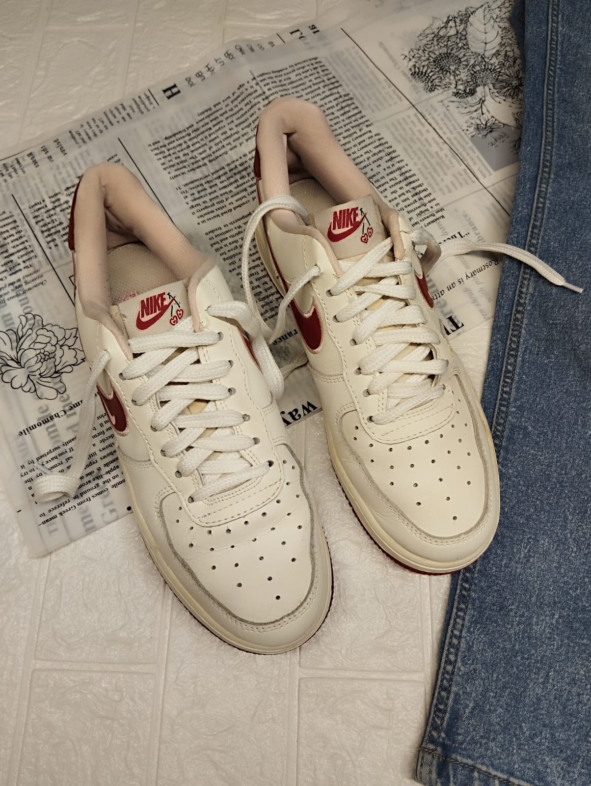 Red and white nike sneakers