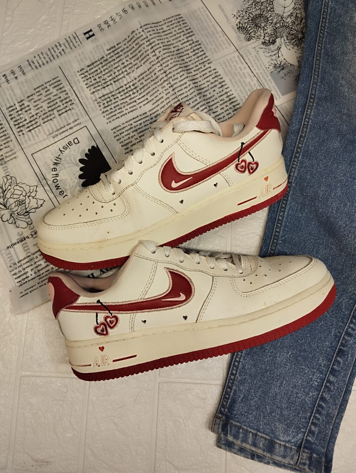 Red and white nike sneakers