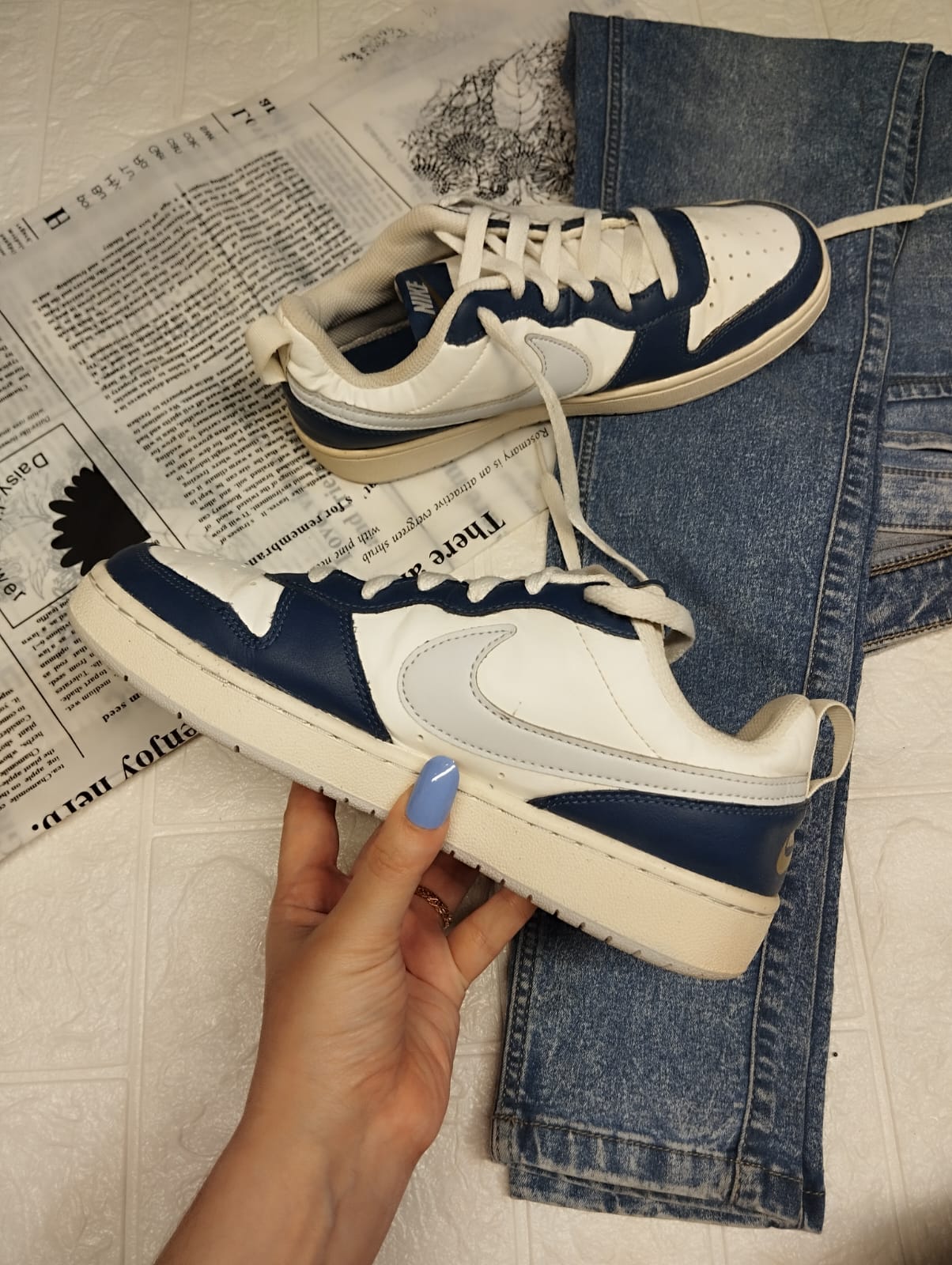 Blue and white nike sneakers