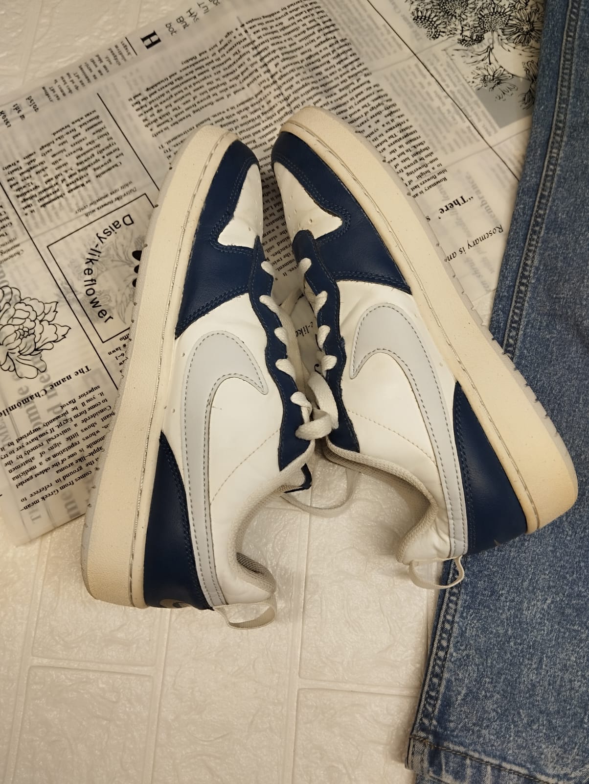 Blue and white nike sneakers