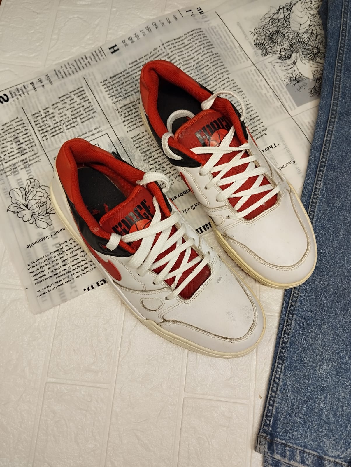 Red and white nike sneakers