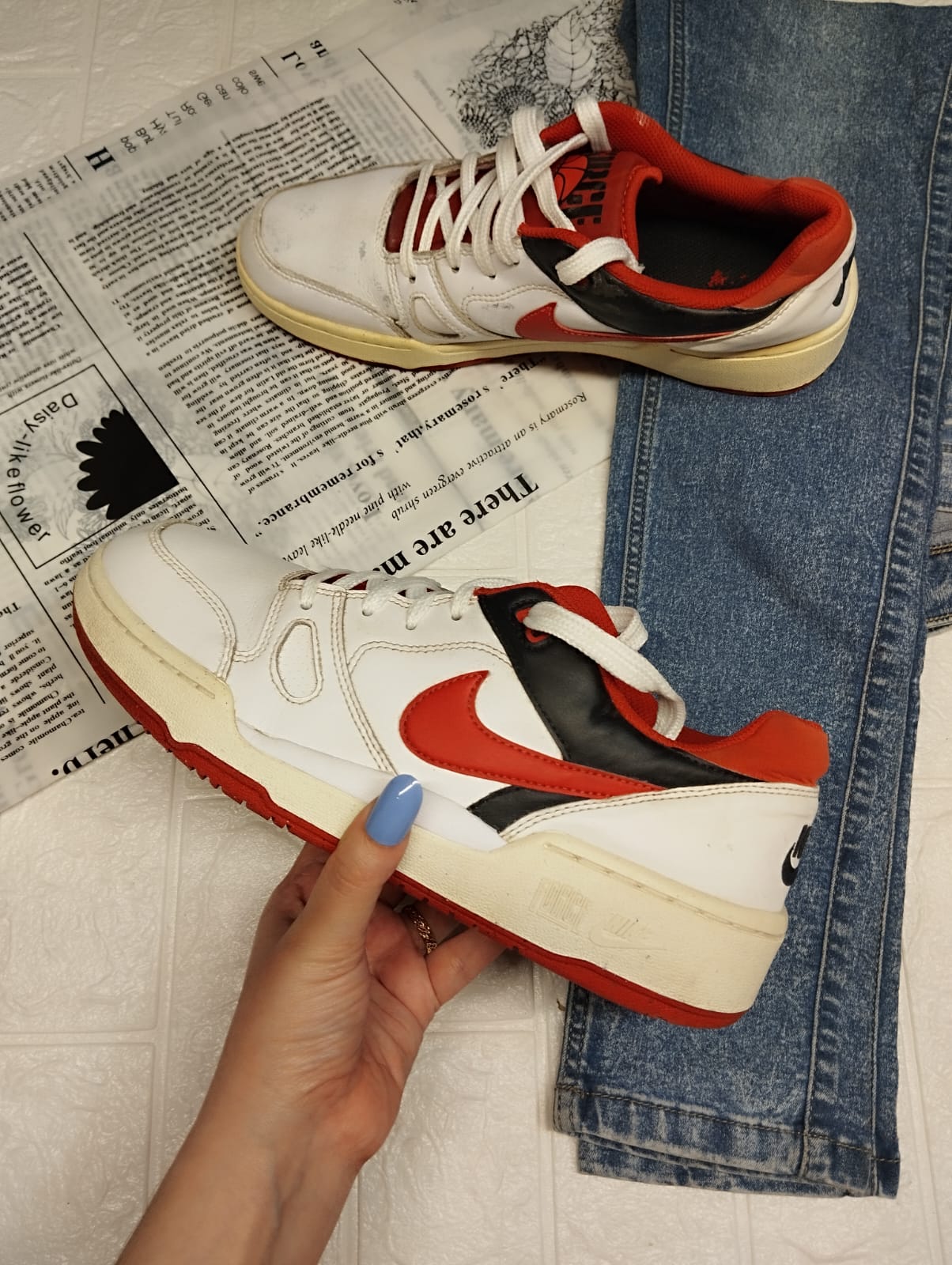 Red and white nike sneakers