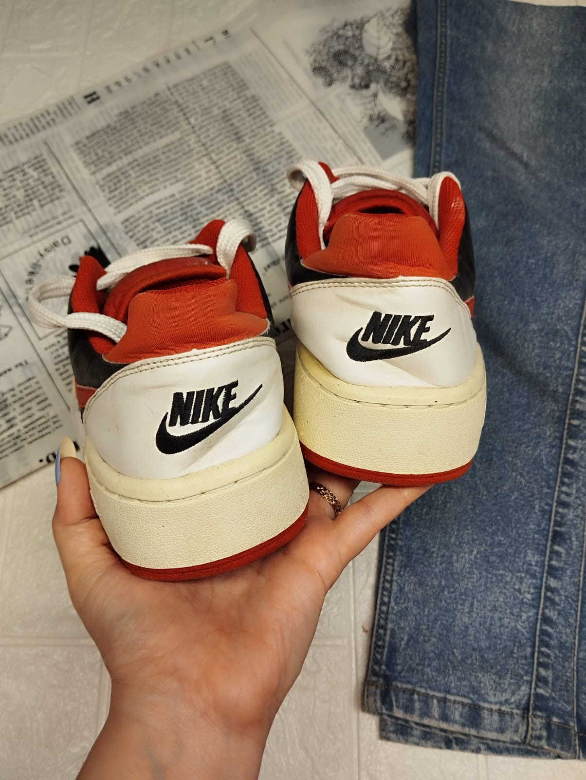 Red and white nike sneakers