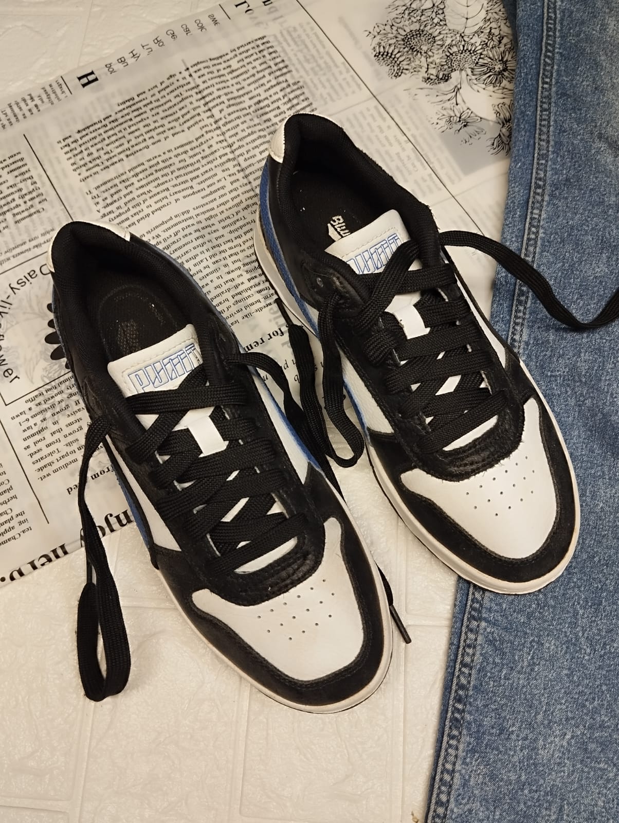 Blue and black puma sneakers