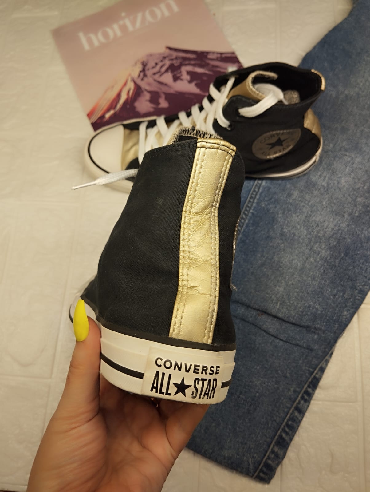 Black and silver high rise converse