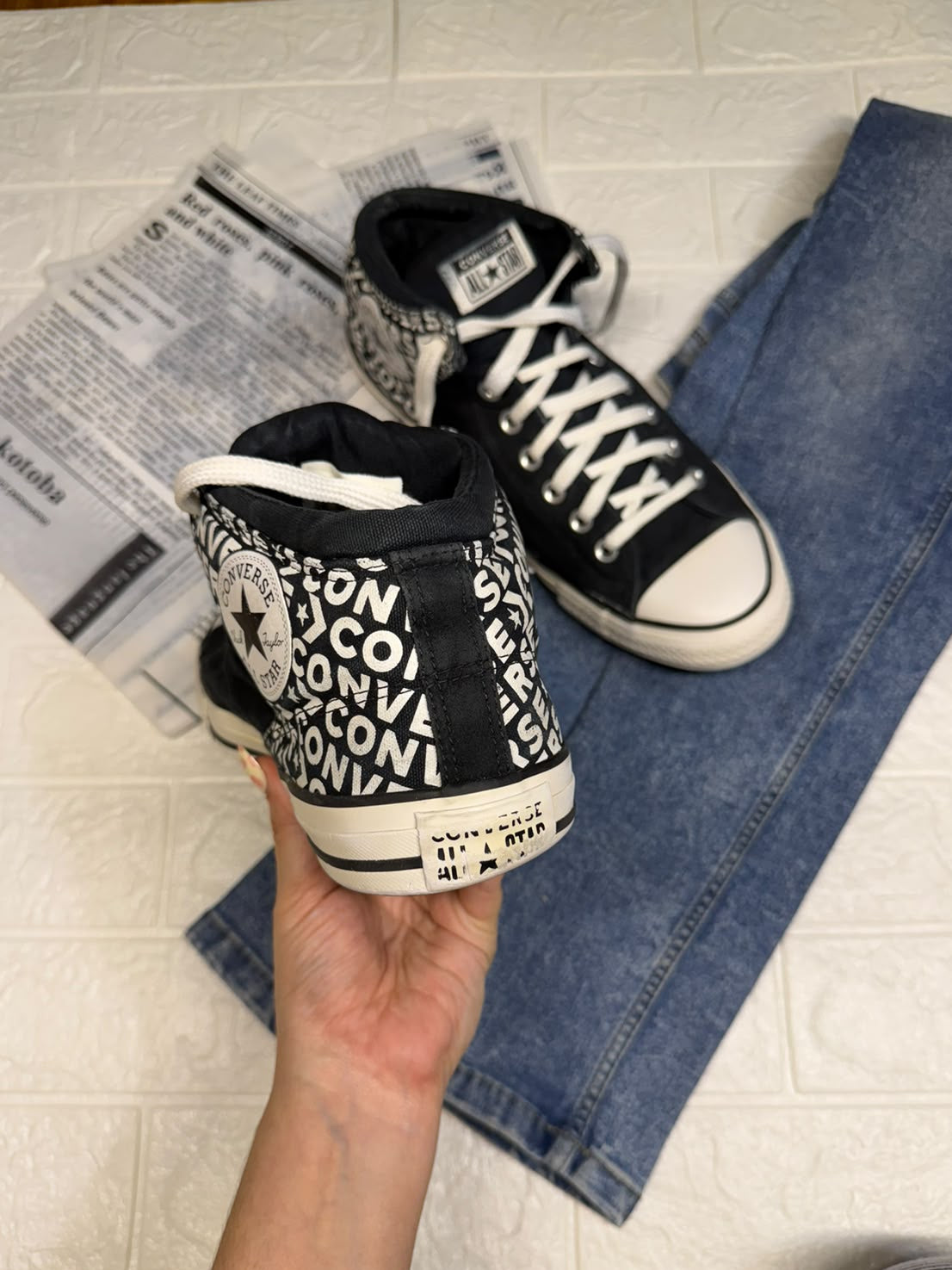 Black and white ankle cut converse