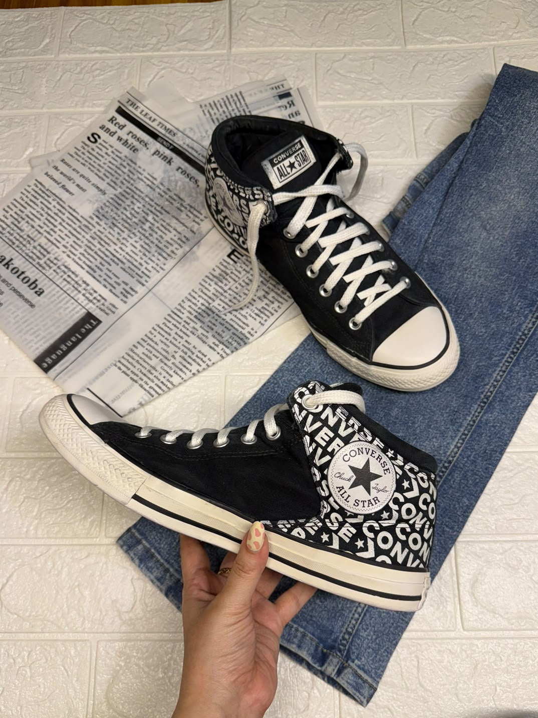 Black and white ankle cut converse