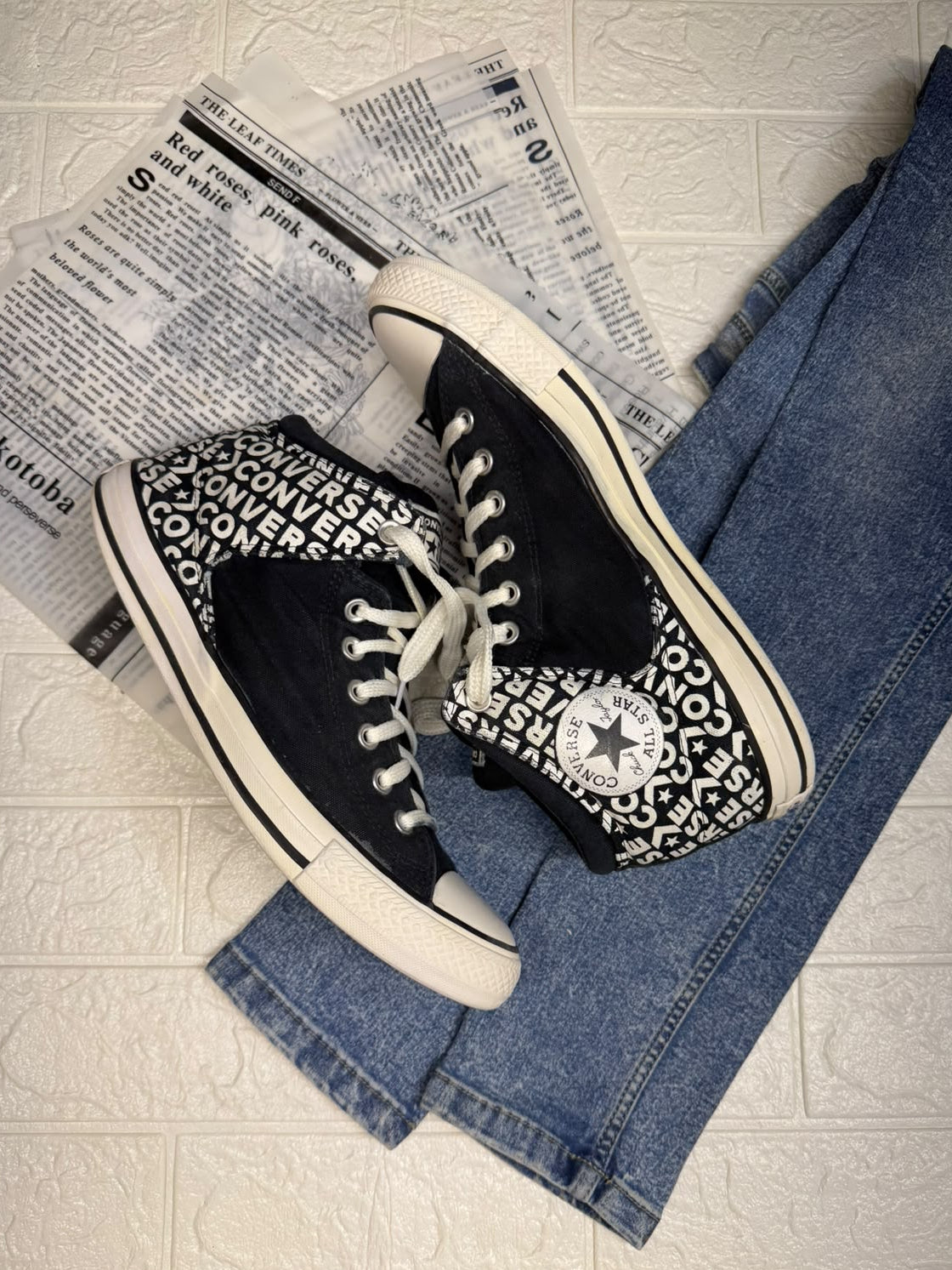 Black and white ankle cut converse