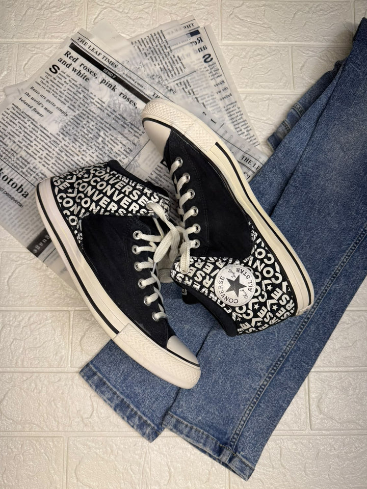 Black and white ankle cut converse