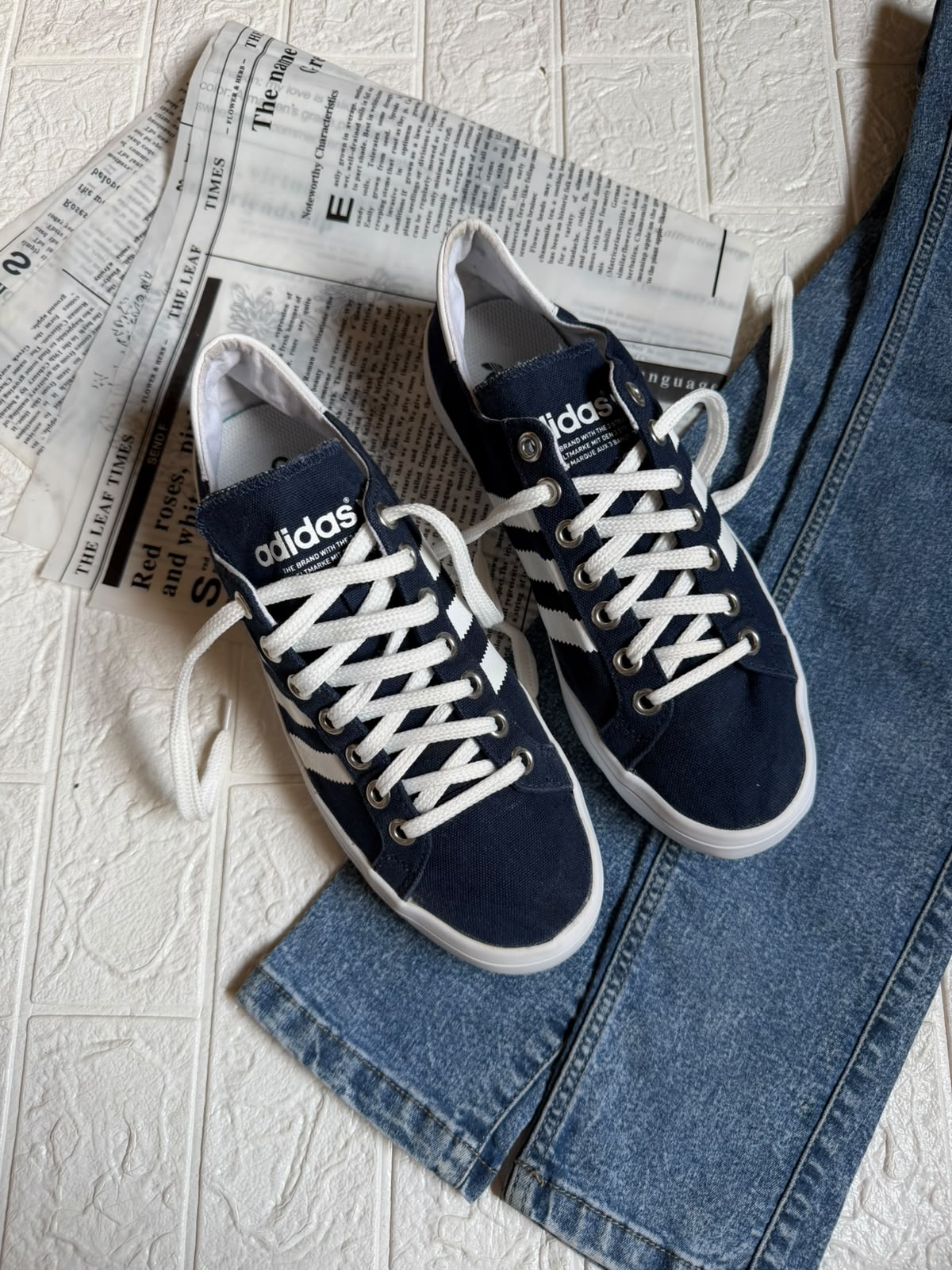 Blue and white adidas