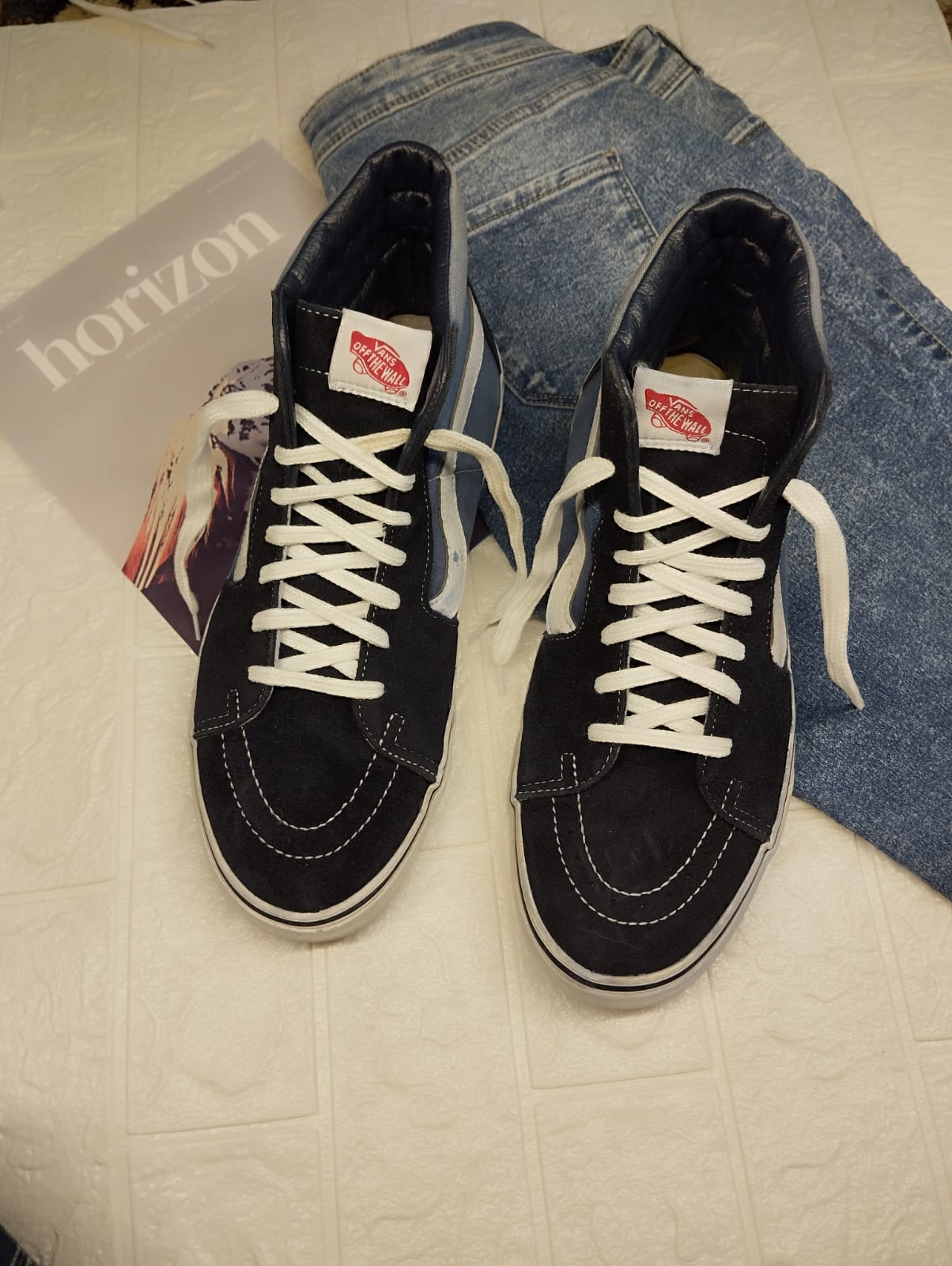 Black and blue high rise vans