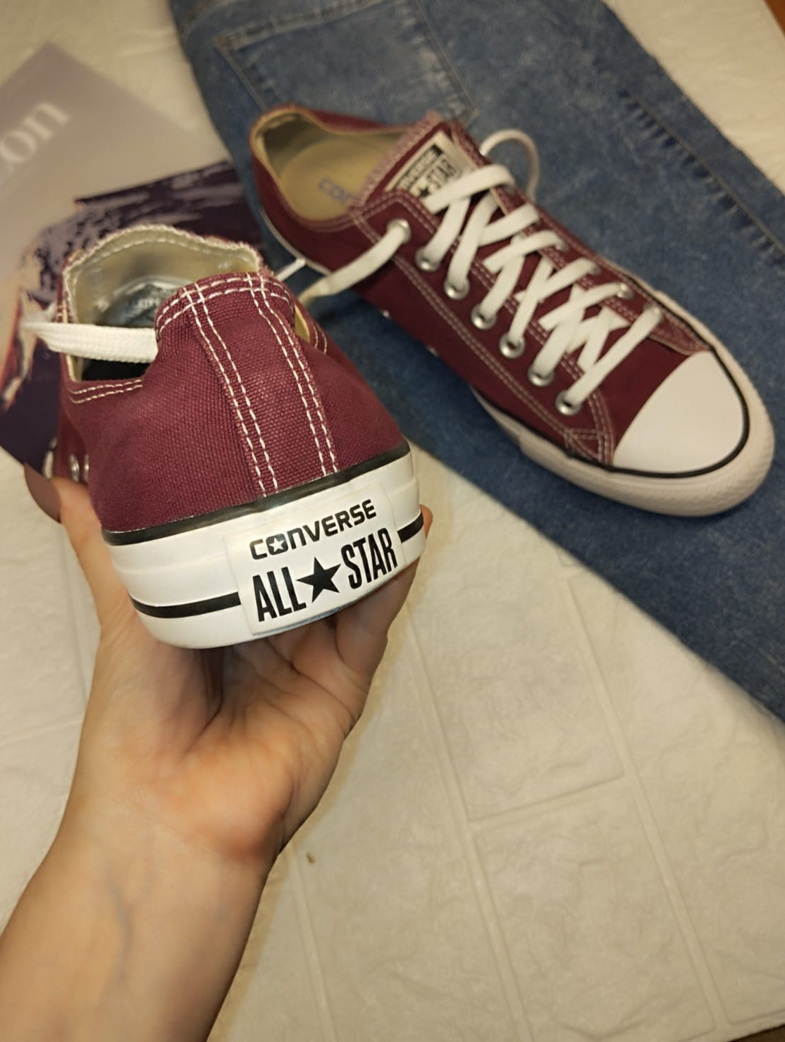 Burgundy low rise converse