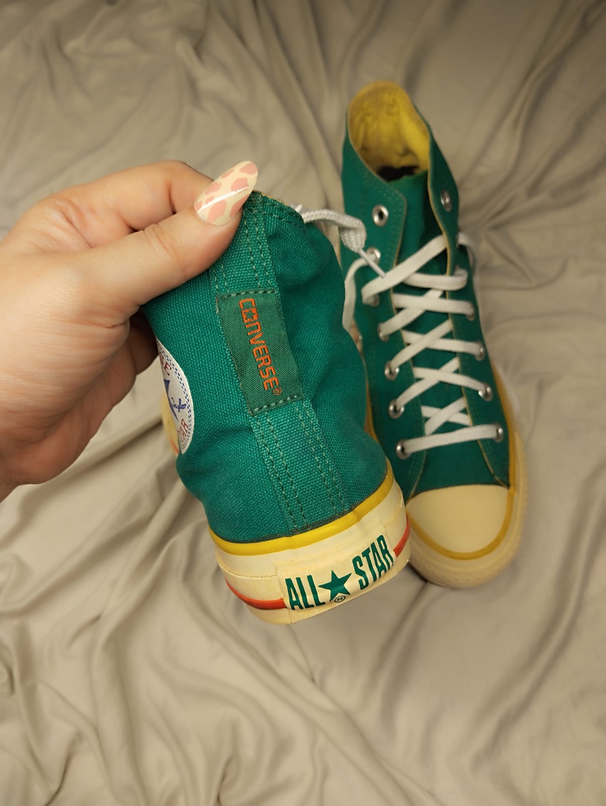 Green high rise converse