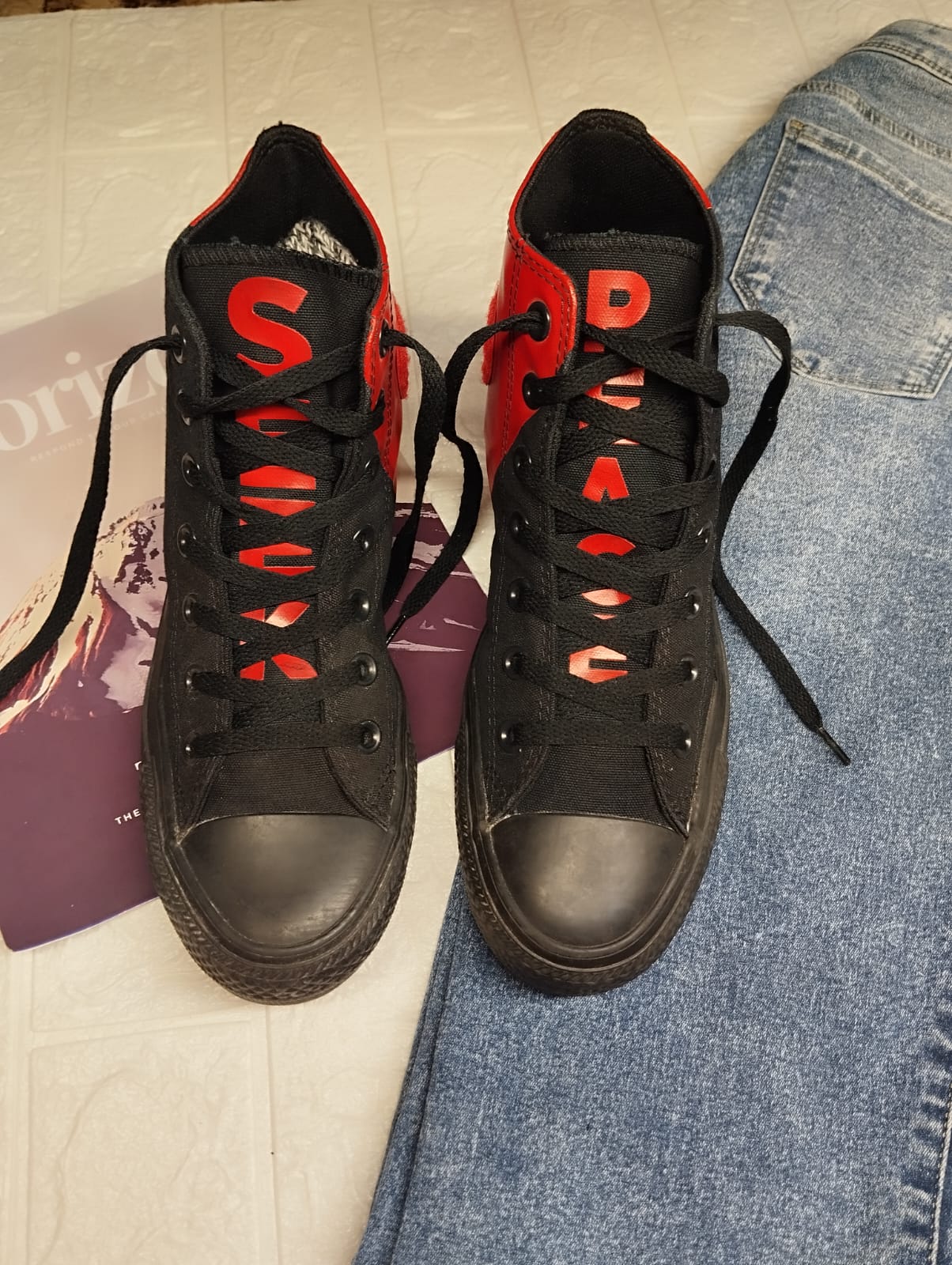 Red and black high rise converse