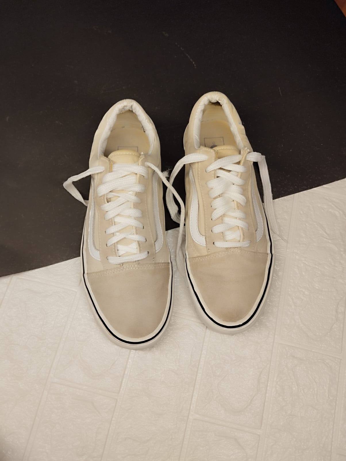 Beige low rise vans