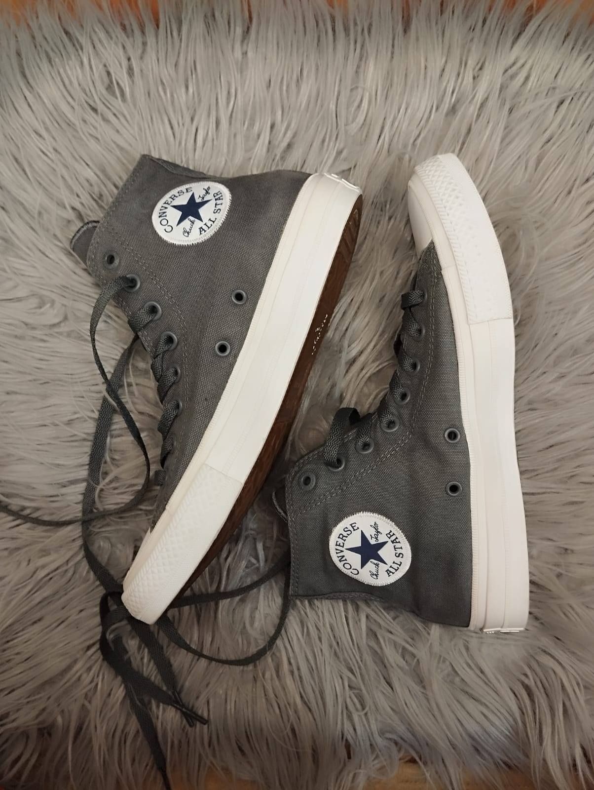 Grey and white high rise converse