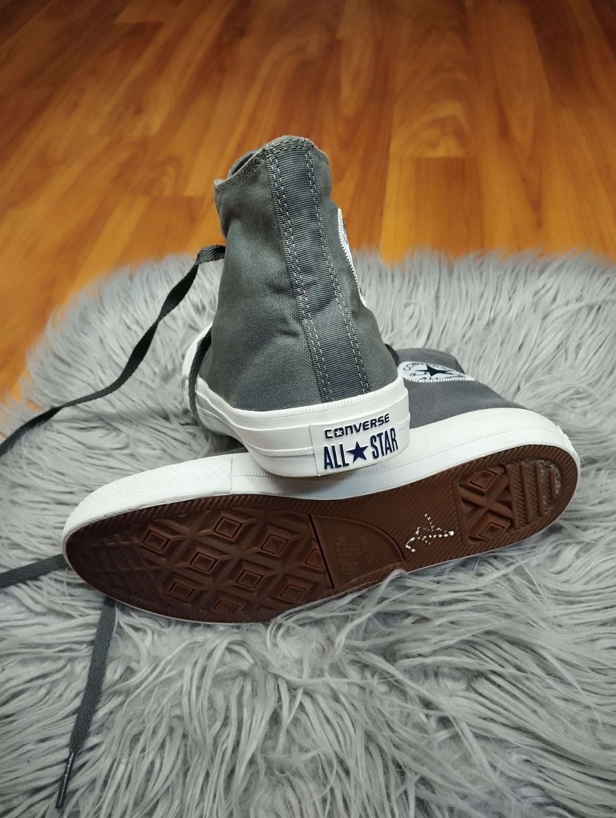 Grey and white high rise converse
